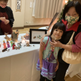 women-and-child-with-nativiyt.jpg